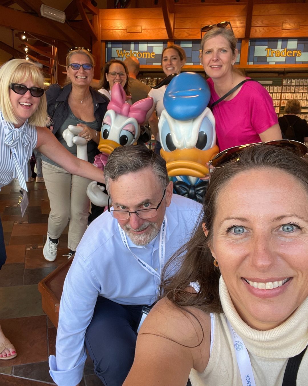 Corporate team collaborating on an interactive game at Disney Springs.